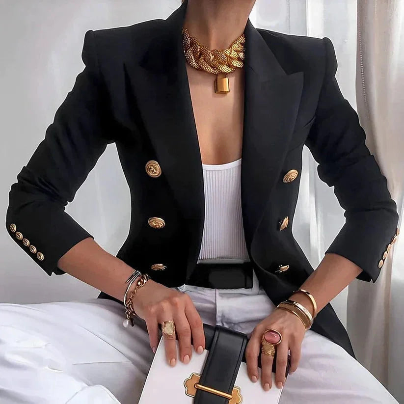 Blazer femme noir à double boutonnage, boutons dorés, coupe élégante en mélange de polyester.