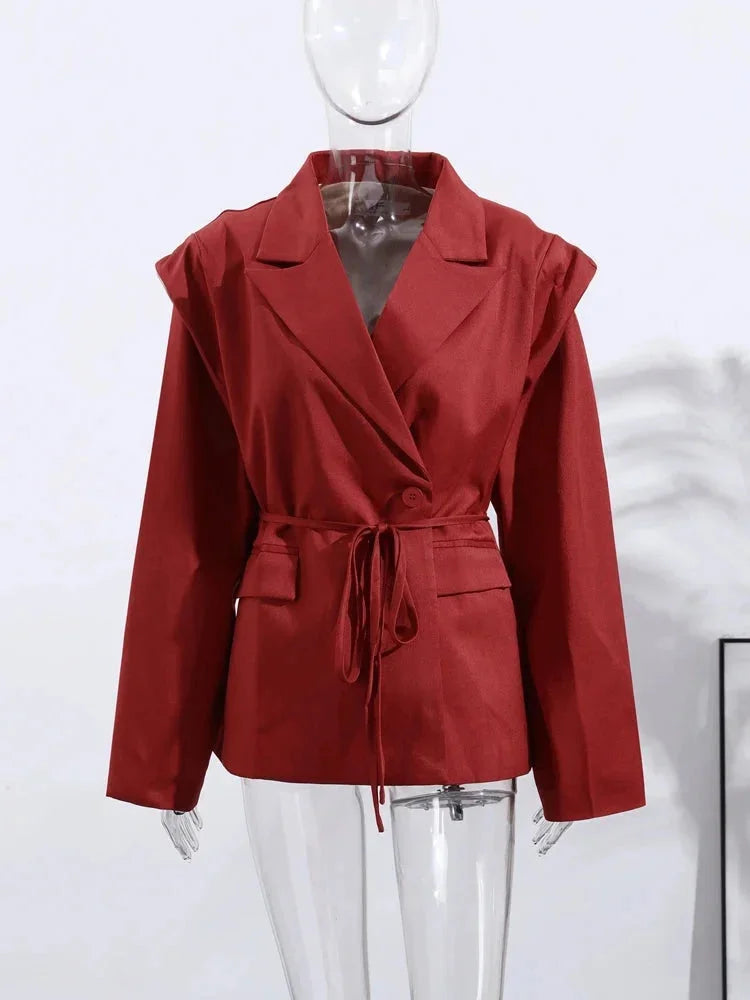 Blazer femme jaune à laçage, avec épaulettes, en tissu léger et respirant.