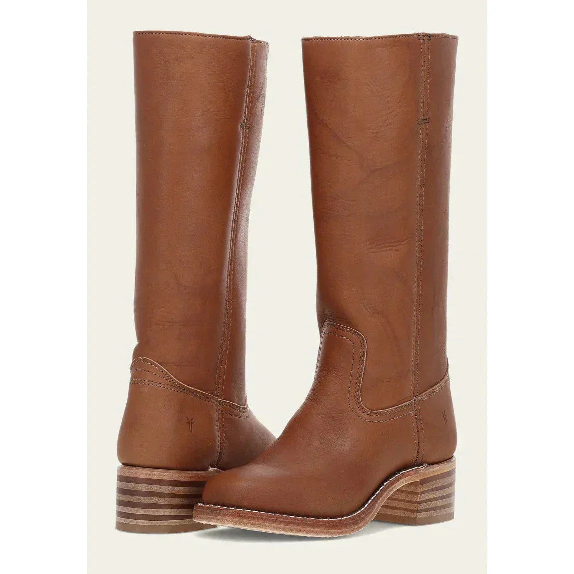 Bottes femme en cuir marron foncé, hauteur genou, avec talon robuste et design traditionnel.