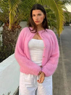 Duvetige Cardigan für Damen aus weicher Strickware mit Knopfdetails und lockerer Passform. Ideal für den Alltag.