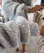 Cardigan gris pour femme, avec manches amples et lien à nouer, en tricot.