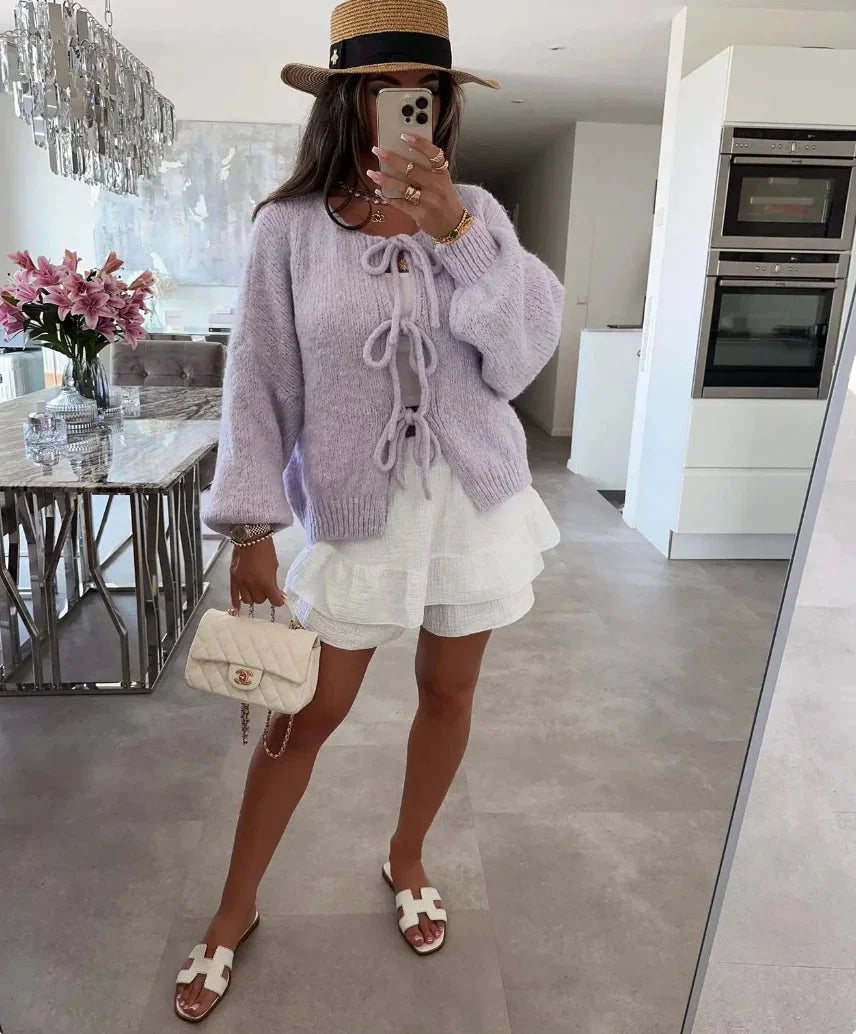 Cardigan femme kaki, tricoté, avec manches amples et détail noué.