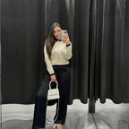 Chic strick Cardigan für Frauen mit Knöpfen, hergestellt aus weicher Wolle, ideal für sanfte Übergangszeiten.