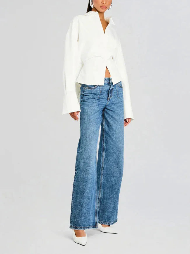 Chemise fluide blanche cassée pour femme, à boutons, en tissu léger, coupe décontractée.