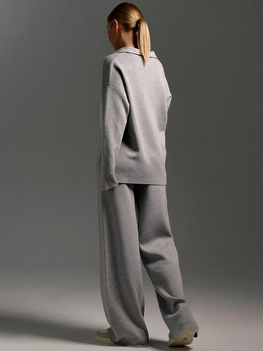 Ensemble femme noir avec col chemise et pantalon ample en coton pour un look décontracté.