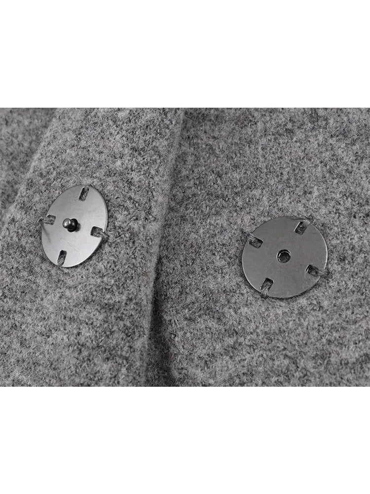 Ensemble gris femme avec jupe courte et veste longue à manches en mélange de coton léger.