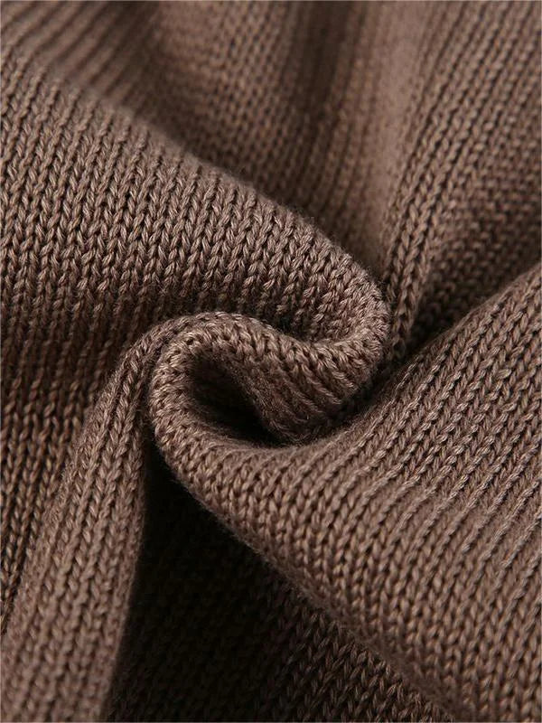 Haut femme en tricot avec dos ouvert et manches évasées.