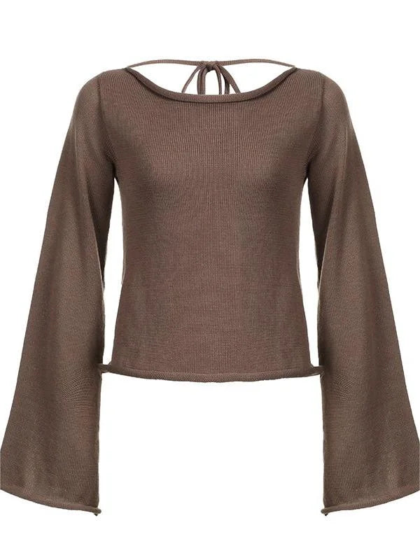 Haut femme noir en tricot, dos ouvert, manches évasées.