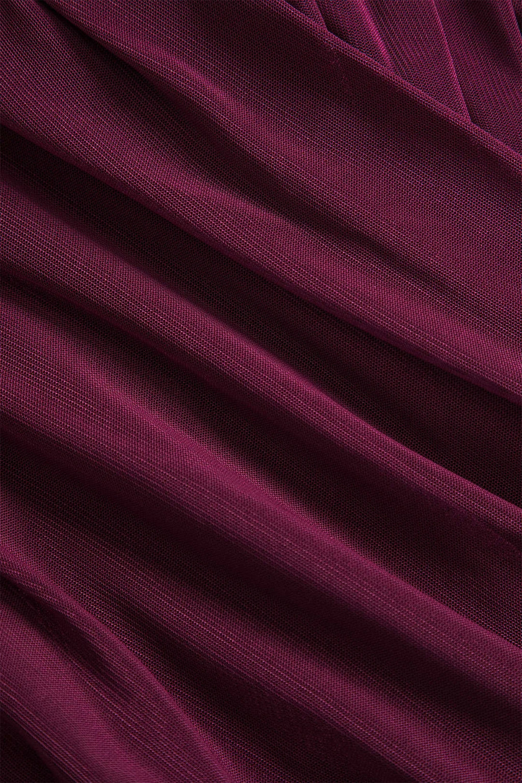 Haut femme noire à manches longues, design plissé transparent en tissu léger pour un style décontracté.