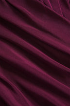 Haut femme noire à manches longues, design plissé transparent en tissu léger pour un style décontracté.