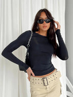 Haut slim femme gris, manches longues, matière extensible, coupe ajustée pour un look quotidien ou habillé.