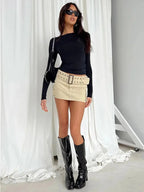 Haut slim femme kaki à manches longues extensibles en tissu doux et respirant.