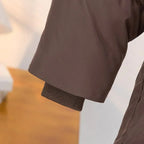 Damenwintermantel mit Gürtel, elegantem Kragen aus weichem Material, ideal für kalte Tage.