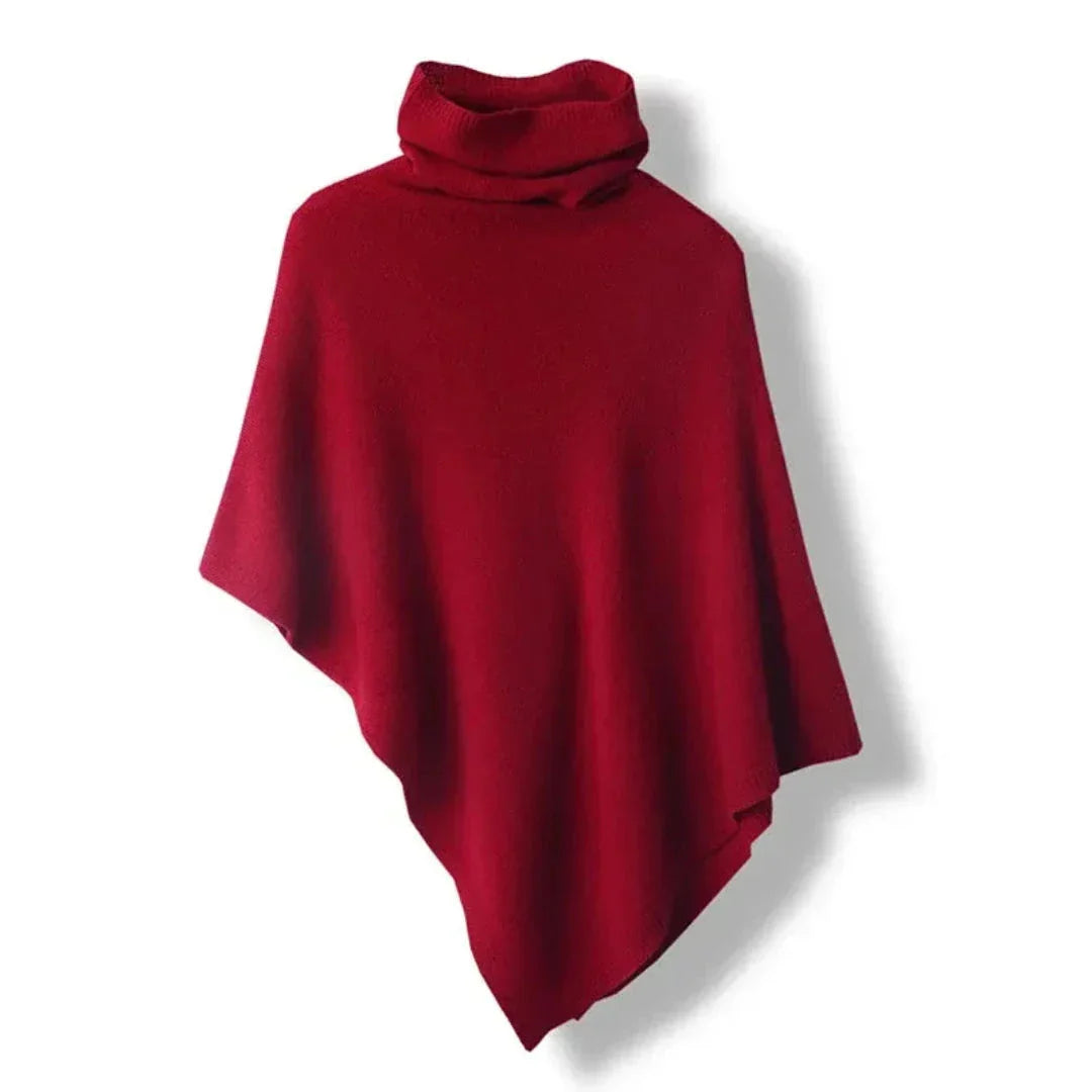 Poncho noir pour femmes avec coupe asymétrique, en tissu doux, adapté aux saisons intermédiaires.