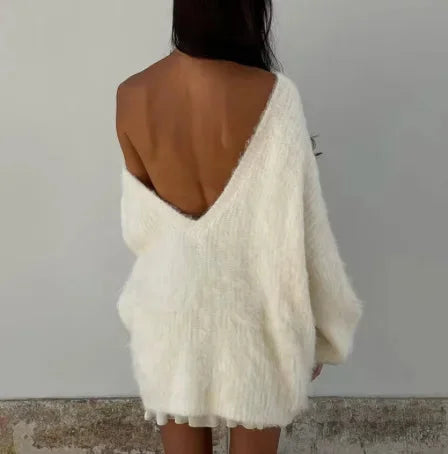 Damen-Pullover aus weicher Baumwolle mit Off-Shoulder-Design und lässiger Passform in sanften Pastellfarben.