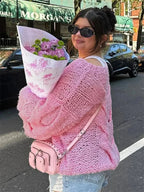 "Bequemer, weit geschnittener Damenpullover aus weichem Strickmaterial, ideal für lässige Freizeitlooks."