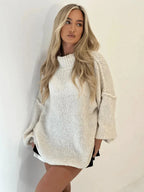 Bequemer, weicher Damenpullover mit Rollkragen, lockerer Passform und zeitloser Strickstruktur. Ideal für entspannte Outfits.