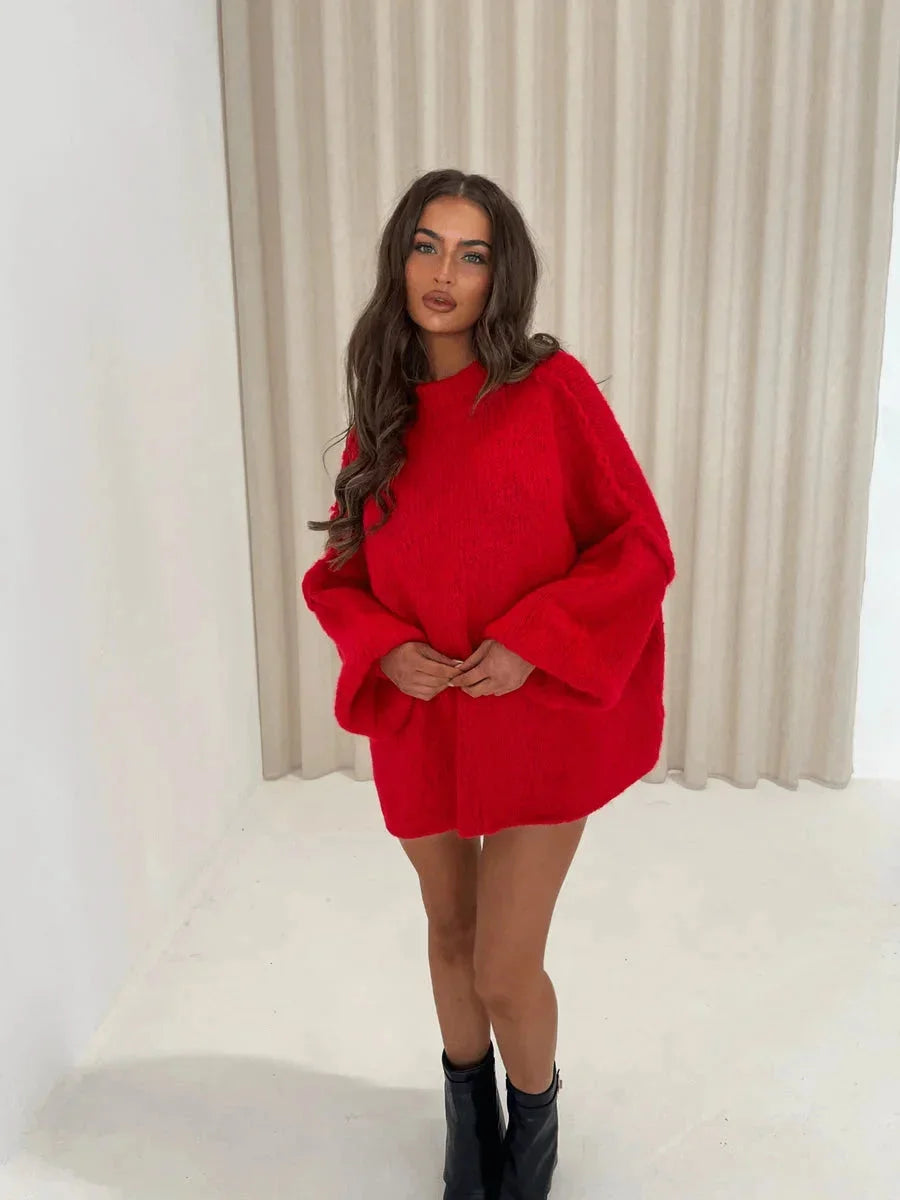 Pull femme ample en coton avec col roulé, disponible en plusieurs couleurs douces.