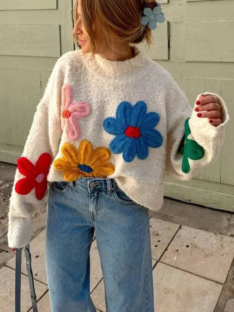Weißer Pullover für Frauen mit bunten Blumenstickereien aus weichem Baumwollmix. Ideal für lässige Anlässe.