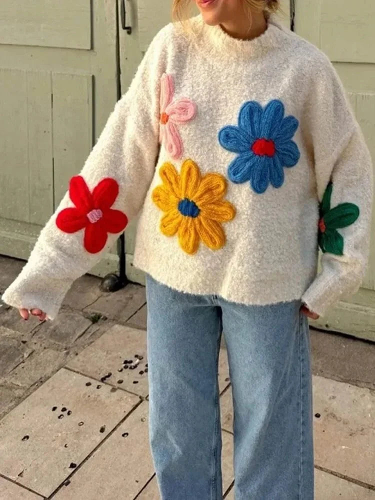 Weißer Pullover für Frauen mit bunten Blumenstickereien aus weicher Baumwolle, ideal für frühlingshafte Looks.