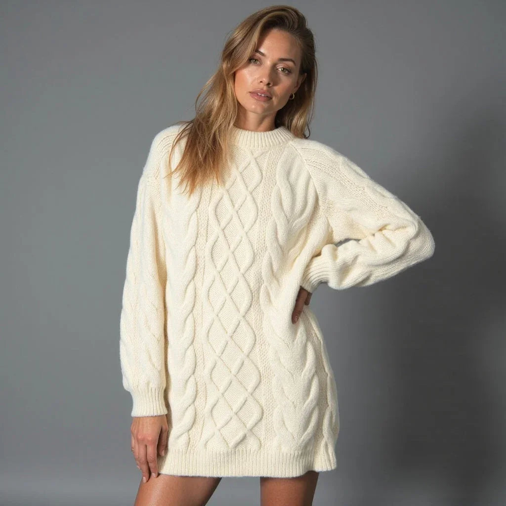 Pull femme crème en tricot avec col rond et motif torsadé. Design confortable pour un usage quotidien.