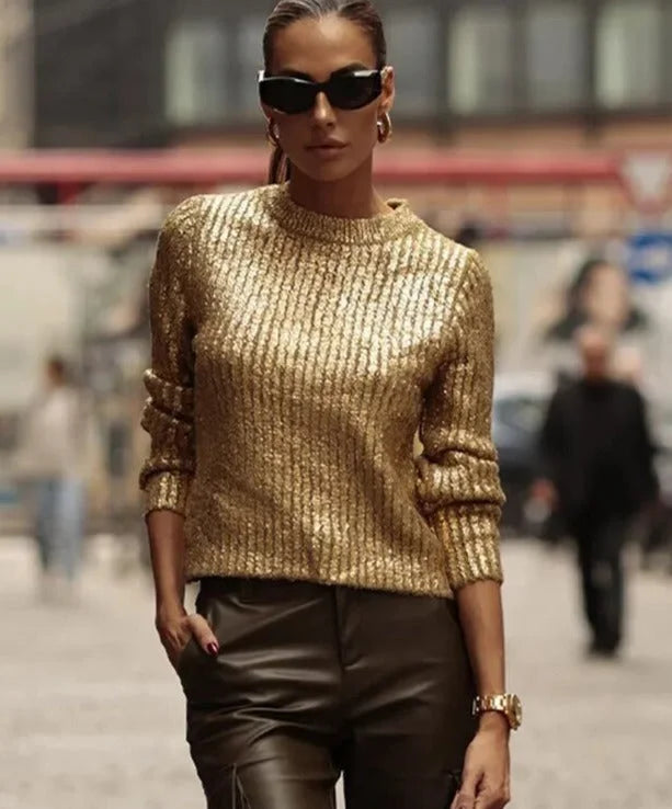 Pull femme doré scintillant à manches longues, en tissu or, adapté pour des occasions festives.