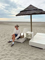 Damenpullover mit modernem, strukturiertem Muster aus weichem, atmungsaktivem Material in neutralen Farben.