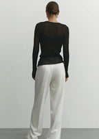 Pull femme noir en maille transparente, style décontracté avec motif en côtes.