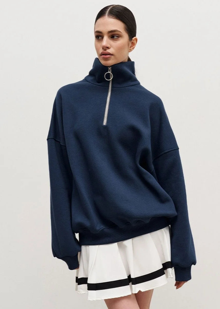 Pull à fermeture éclair bleu marine, en mélange de coton, coupe décontractée et finitions côtelées.