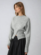 Grauer Pullover für Damen mit Halbreißverschluss, langen Ärmeln und weichem, gestricktem Material für Komfort und Stil.