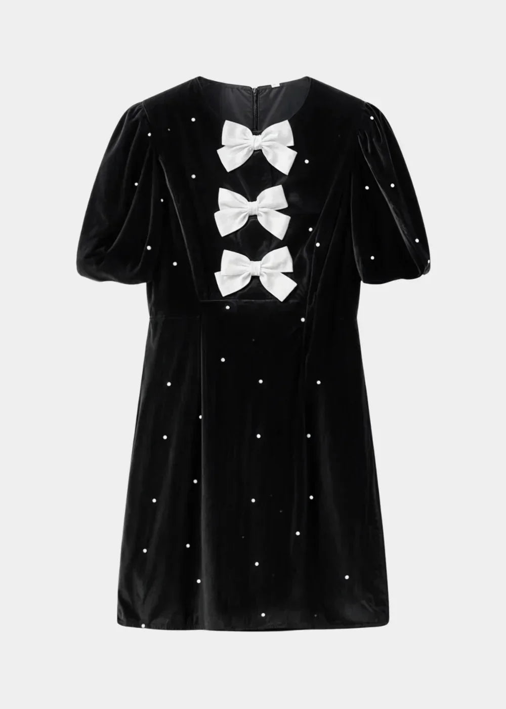 Robe courte à pois avec nœuds et manches bouffantes, en tissu léger, parfaite pour les soirées d'été.