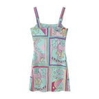 Robe courte sans manches en tissu léger pastel avec motif sirène, idéale pour les journées d'été à la plage.
