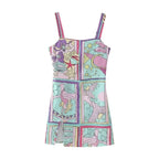 Robe courte sans manches avec imprimé sirène pastel, en coton léger, idéale pour l'été et les journées à la plage.