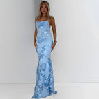 Robe longue femme en coton léger, motifs floraux, bretelles fines et décolleté doux, idéale pour les journées ensoleillées.