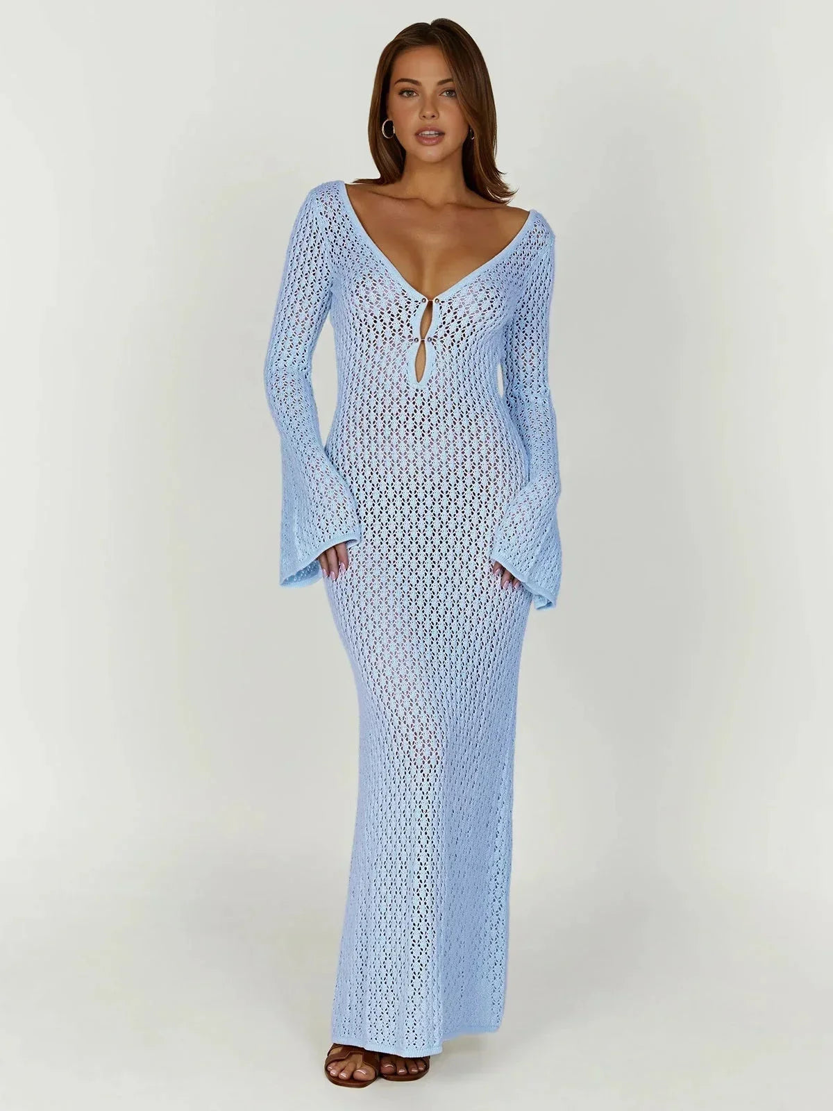 Robe longue en tricot, avec lien décolleté et manches longues, idéale pour un style décontracté et confortable au quotidien.