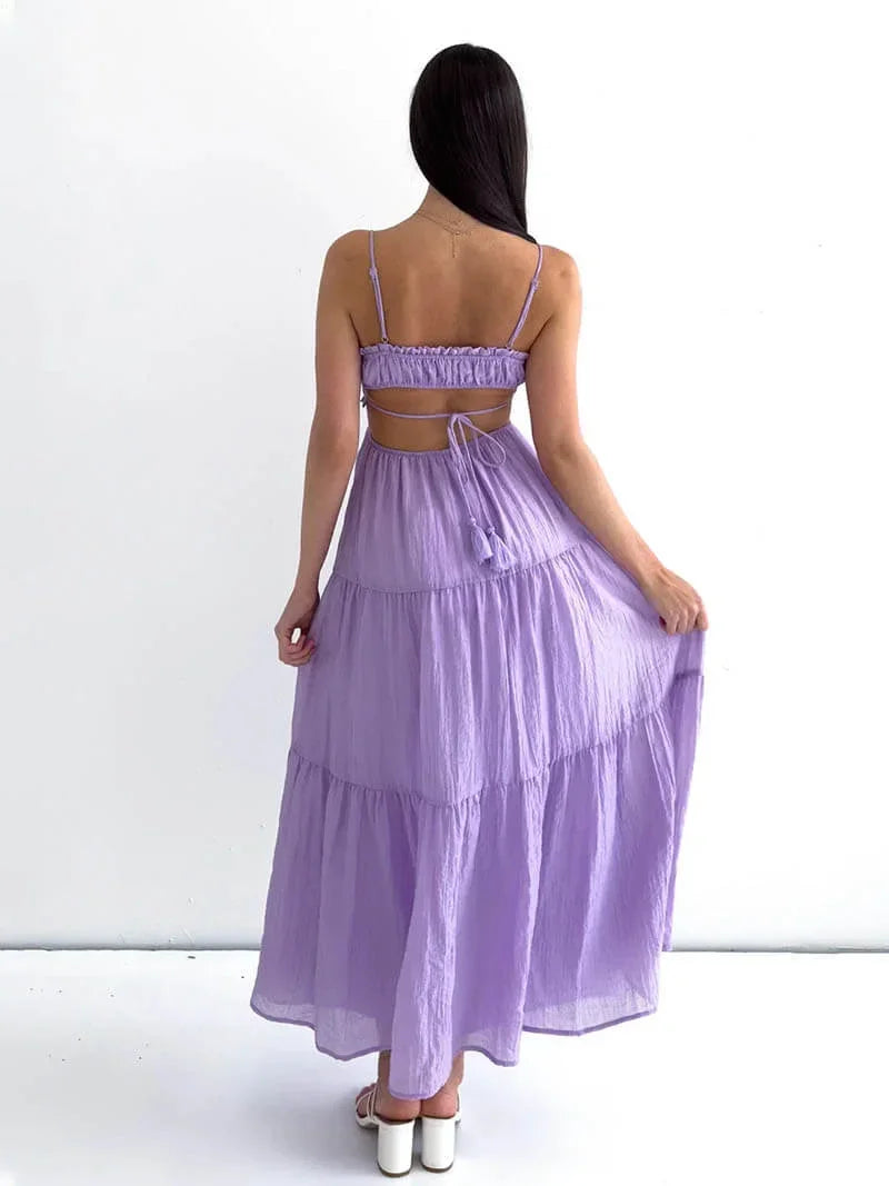 Robe longue en tissu léger, à volants, avec cordon ajustable et bretelles fines, idéale pour l'été décontracté.