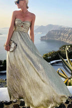 Robe longue bustier en satin brillant, avec nœud à la taille, idéale pour les soirées et les événements spéciaux.