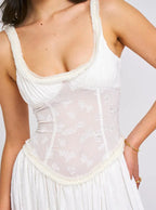 Robe maxi femme en tissu léger, bretelles fines et fente haute, idéale pour les journées chaudes ou les soirées…