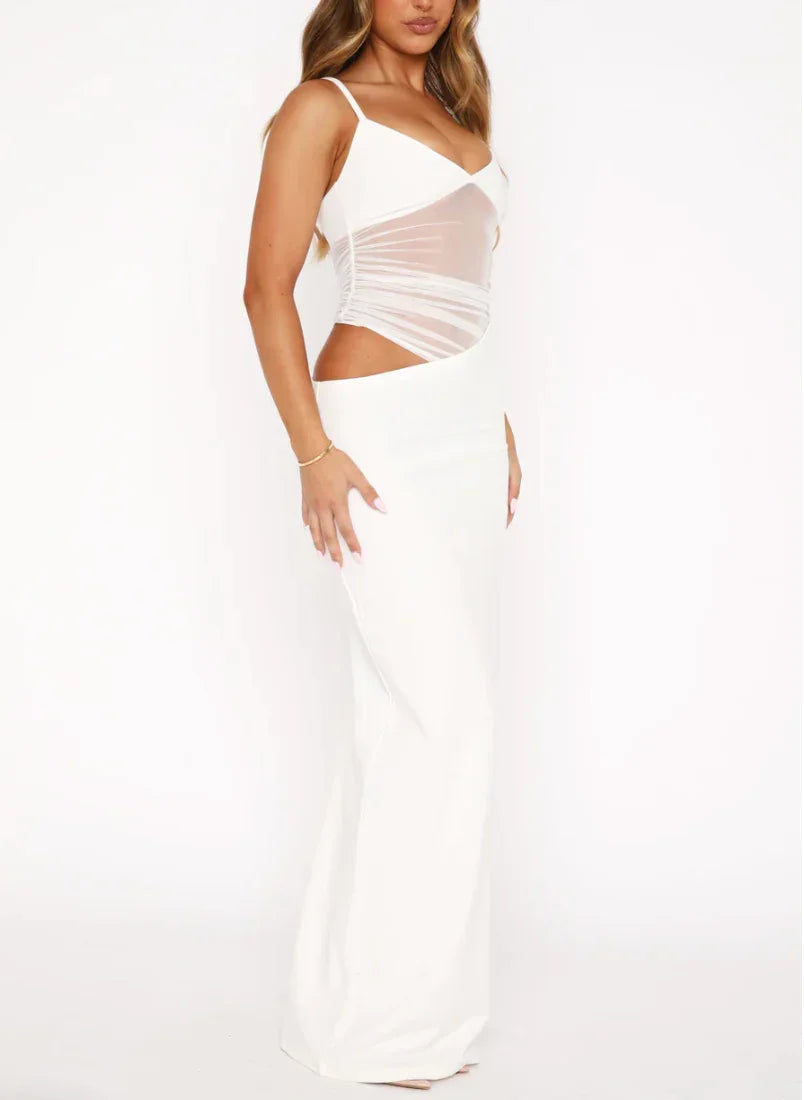 Robe maxi femme en jersey, avec découpes élégantes et bretelles fines pour un look fluide et moderne.