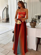 Robe maxi femme en polyester avec dégradé orange et dos nu, idéale pour des occasions décontractées.