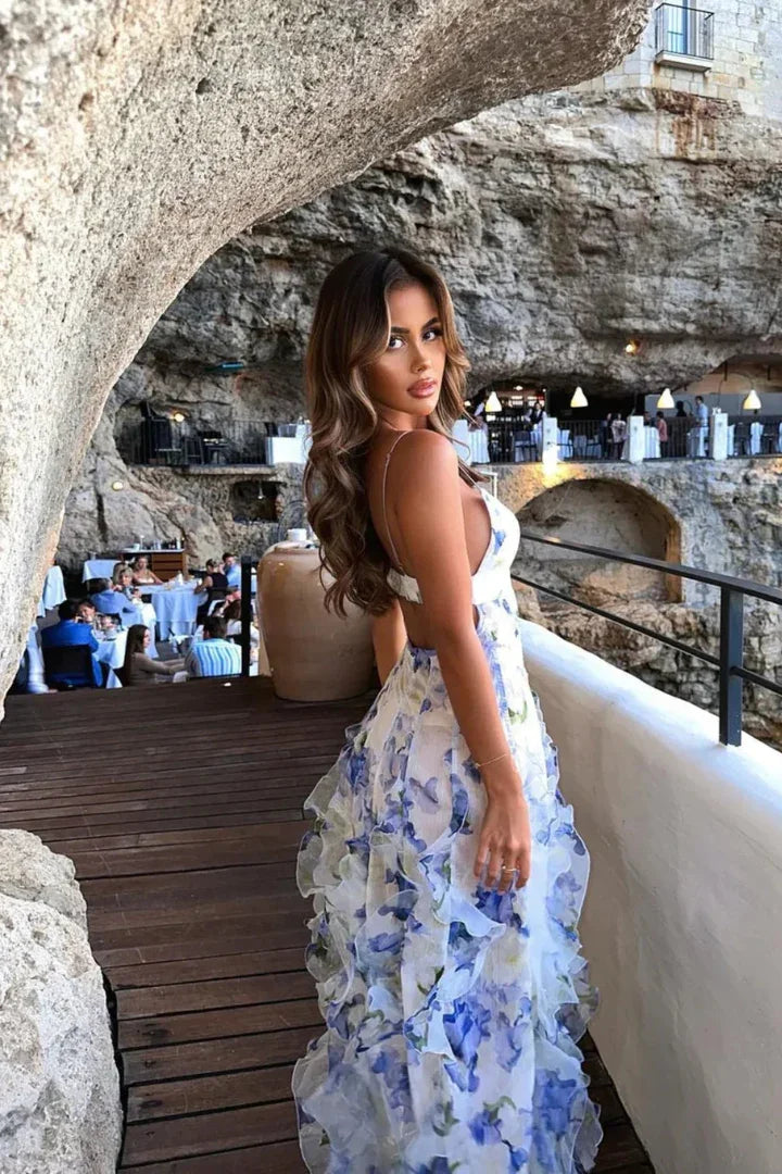 Robe maxi femme à imprimé floral, à bretelles fines, fabriquée en tissu léger et respirant pour un confort tout au long de…