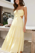 Robe longue femme légère, avec volant, bretelles fines et dos nu, idéale pour l'été. Tissu fluide et confortable.