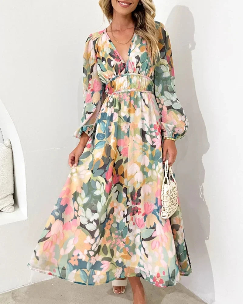 Robe longue fleurie pastel en viscose, manches longues, col en V, idéale pour le printemps et l'été. Design chic et…