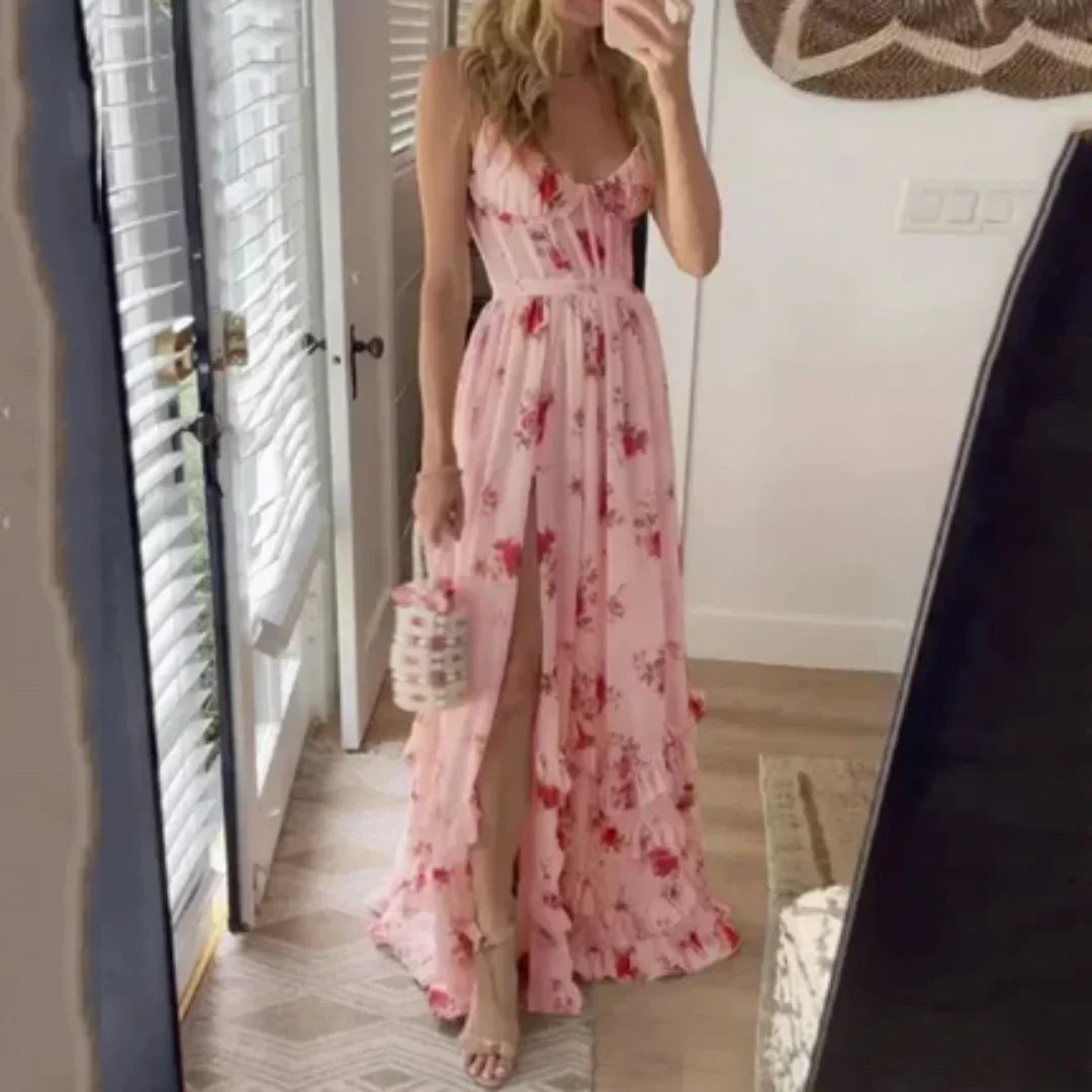 Robe longue fleurie sans manches, fente élégante, col décolleté en tissu léger, idéale pour l'été et les journées ensoleillées.