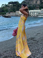 Robe longue sans bretelles à fleurs jaunes, en coton léger, parfaite pour l'été, style décontracté et élégant.