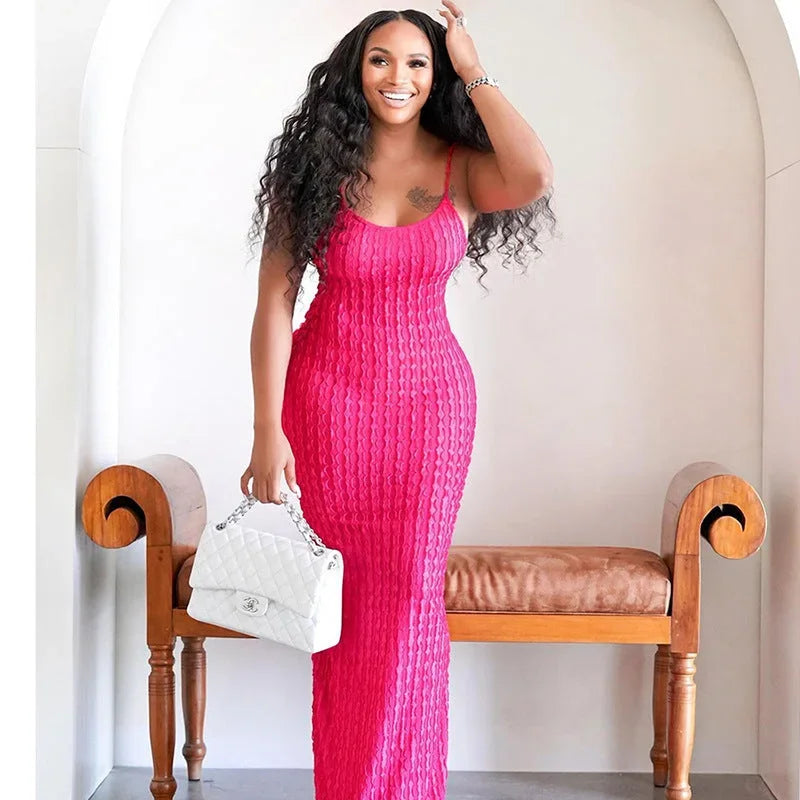 Robe longue moulante en dentelle, sans manches, dos nu, disponible en plusieurs couleurs, parfaite pour les soirées élégantes.