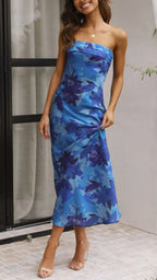 Robe longue sans bretelles avec motifs floraux, en tissu léger et respirant, parfaite pour les journées estivales.