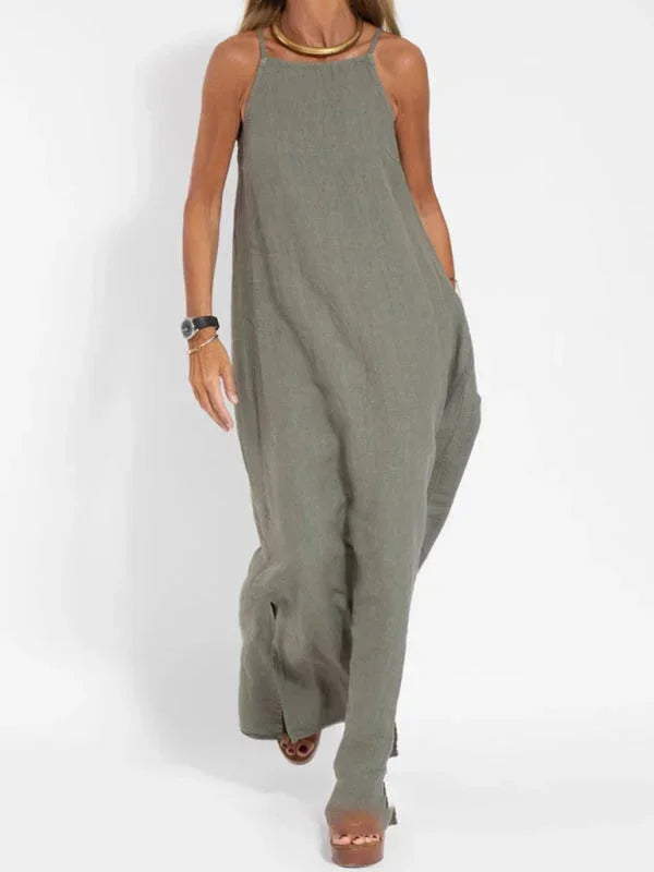 Robe longue sans manches en tissu léger, coupe fluide, idéale pour une tenue décontractée estivale.