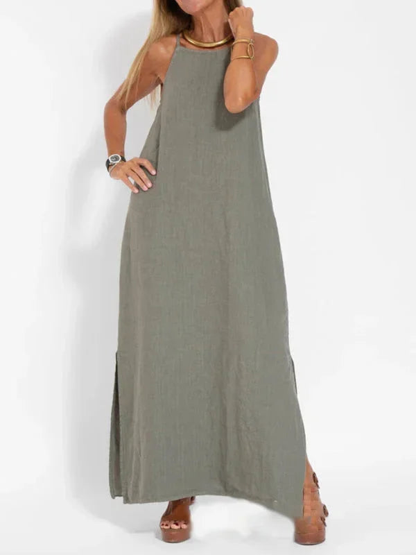 Robe longue sans manches en tissu léger, coupe fluide, idéale pour des journées d'été décontractées et polyvalentes.
