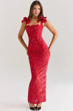 Robe longue sans manches en dentelle avec nœuds, conçue en tissu léger, mettant en valeur une silhouette élégante et délicate.